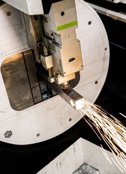 CNC Laser cutting metal square tube.